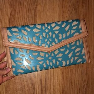 Sondra Roberts blue and tan clutch